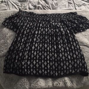 Off the shoulder, black detailed tee